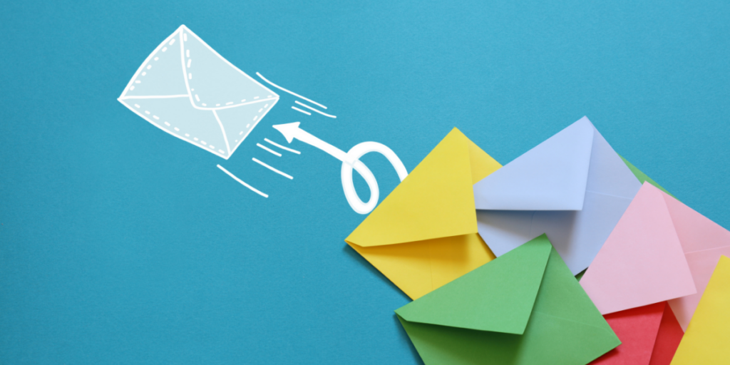Colorful paper envelopes with a drawn paper airplane on a blue background.