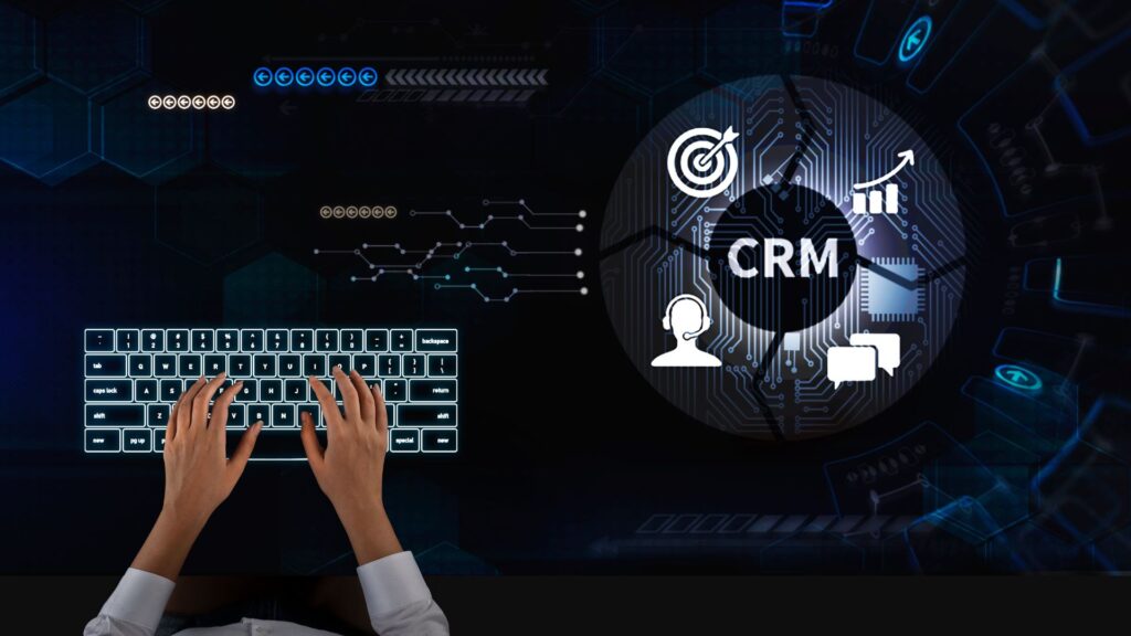 Hands typing on a keyboard with symbols representing CRM for Agency (Customer Relationship Management) on a dark technological background.