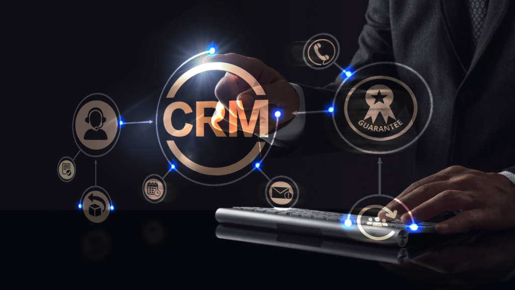 Businessman using CRM software on a digital interface with various icons representing communication and guarantee concepts.